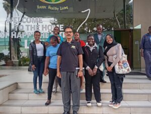 TF Scholar Anita next to Vimal Shah after a mentorship & industry exposure session at BidCo