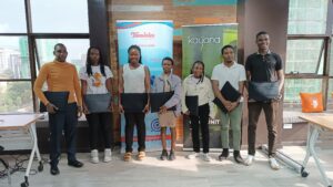 Tuendelee scholars receive computers to facilitate their studies