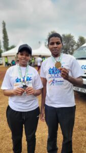 Mary Mbithe & Dennis Lowaso finish the Kandara Marathon in support of Kandar High School scholarship kitty